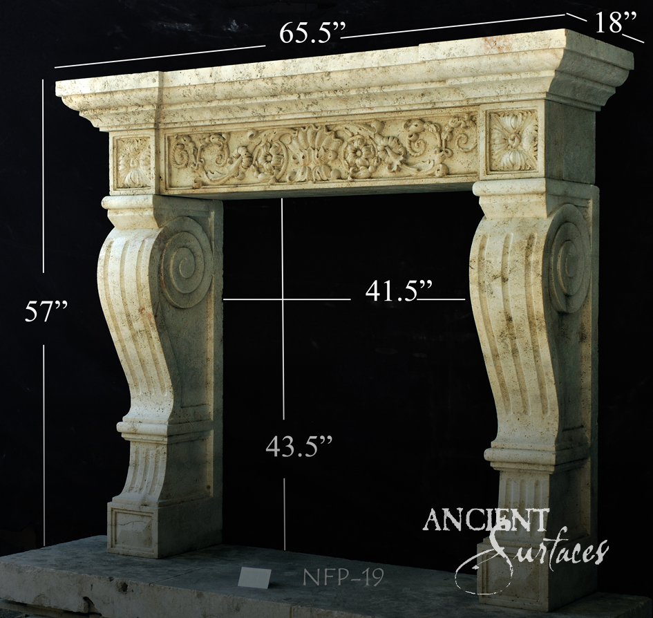 Carved reclaimed limestone fireplace mantel with a scrolling foliate frieze, rosette end blocks and fluted spiral volute console jambs